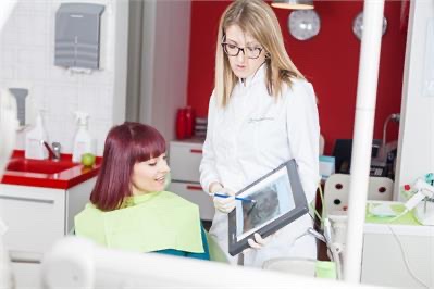 Dentist explaining treatment